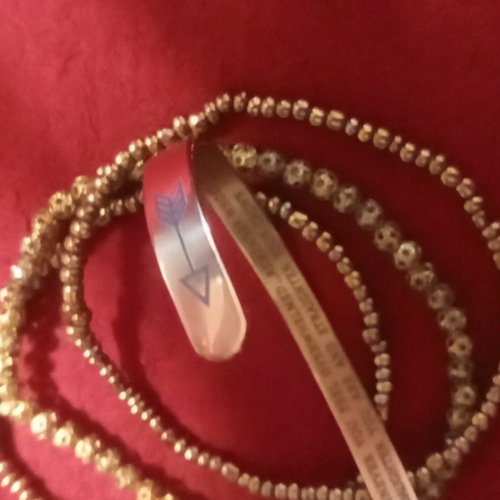 Inspirational cuff bracelet with three matching expandable beaded bracelets